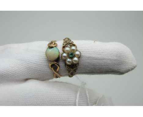 A Dainty Seed Pearl Set Flowerhead Cluster Ring, with inset highlight to centre, between pierced shoulders (finger size O) (1