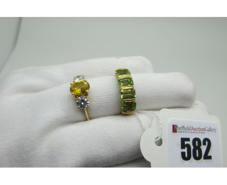 A Modern DQCZ Three Stone Dress Ring, graduated claw set, stamped "585" "14K", (finger size Q) (3grams); together with a 9ct 