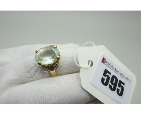A Modern Single Stone Dress Ring, oval four claw set, between inset highlights, stamped "585" "14K", (finger size N) (5.5gram