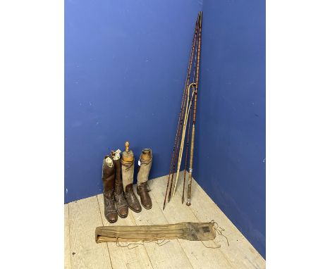 Quantity of vintage wooden boot trees, boots, riding boots, 2 camel sticks, and vintage fishing rods (labelled Hardy) etc 