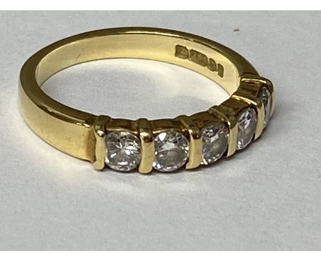 An 18ct gold five stone diamond ring size I, 3.33g 