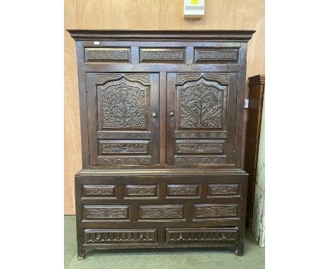 Large C17th Style heavy carved 2 door oak court cupboard, with 1 modern shelf to interior and hanging pegs, 2 small drawers t