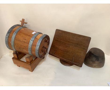 Vintage wooden and bound barrell , and an oak desk top lecturn, and a vintage wooden hat block 
