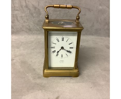 Asprey: a brass carriage clock with French movement, white enamel dial, Roman numeral markers, Asprey Bond St London, 16cm in