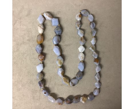 A vintage blue lace, carved hardstone Agate necklace, boxed, 80cm 