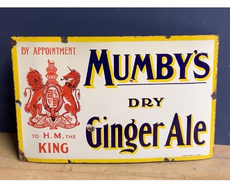 An enamel advertising sign, Mumby's dry ginger ale, some losses to drill holes, 75 x 50cm 