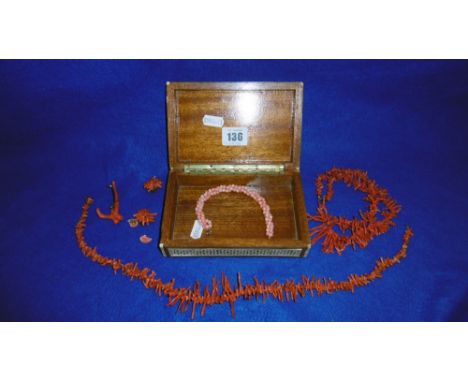 A QUANTITY OF CORAL JEWELLERY IN A MOTHER OF PEARL INLAID BOX