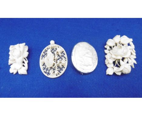 A LATE VICTORIAN BROOCH AND PENDENT AND A MOTHER OF PEARL BROOCH AND A CARVED CORAL BROOCH