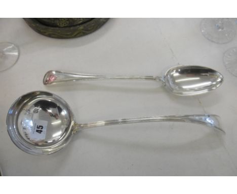 A SILVER PLATED LADLE AND BASTING SPOON