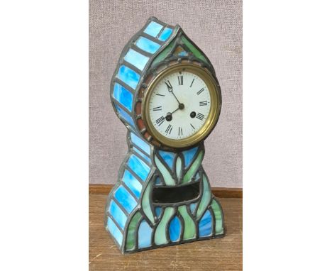 A Tiffany style glass mantel clock 