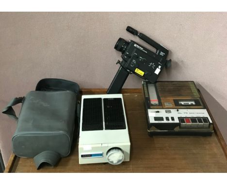 A Sankyo XL320 camera, an ITT radio recorder and Rank Aldis projector