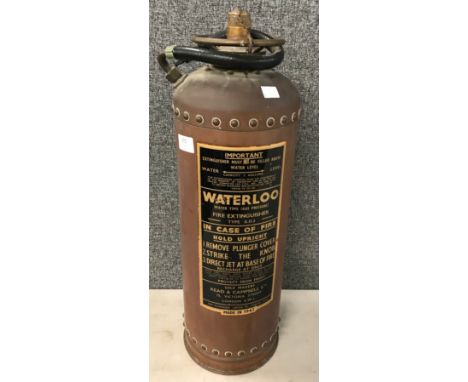 A vintage Waterloo fire extinguisher 