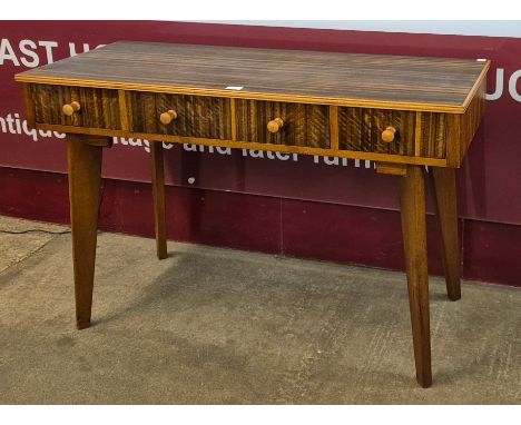 A Morris of Glasgow Cumbrae afromosia three drawer console table, designed by Neil Morris