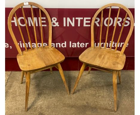 A pair of Ercol Blonde elm and beech Windsor chairs 