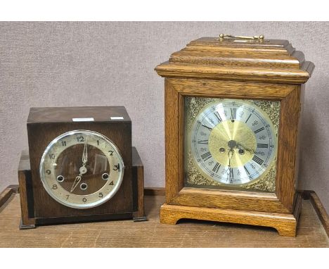 An Art Deco oak mantel clock and a French oak cased Mesnierfils bracket clock 