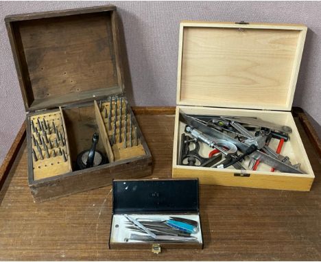 Three cases of assorted watchmakers tools 