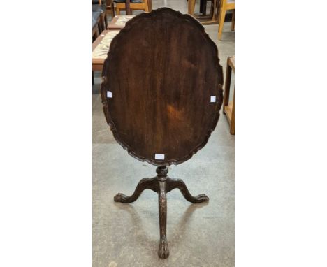 An Edward VII Chippendale Revival carved mahogany tilt top tripod occasional table 