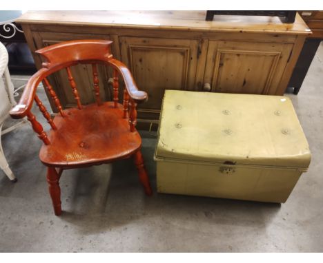 An elm and beech smokers bow chair and a metal trunk 
