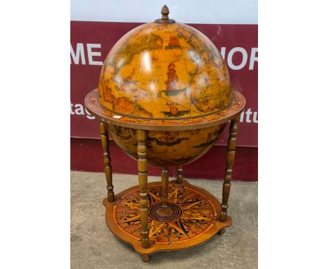 An Italian terrestrial globe cocktail cabinet/trolley 