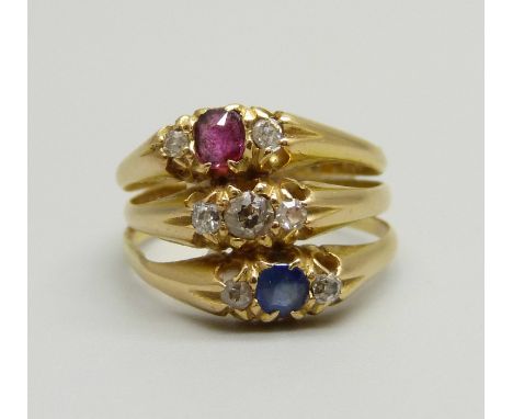 A Victorian 18ct gold triple ring set with diamonds, a sapphire and a ruby, (three rings placed together), 4.2g, J 