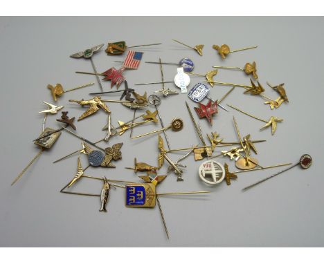 A collection of mainly aviation related stick pins 