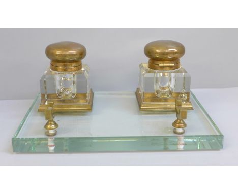 A pen stand with double inkwell, one inkwell chipped 