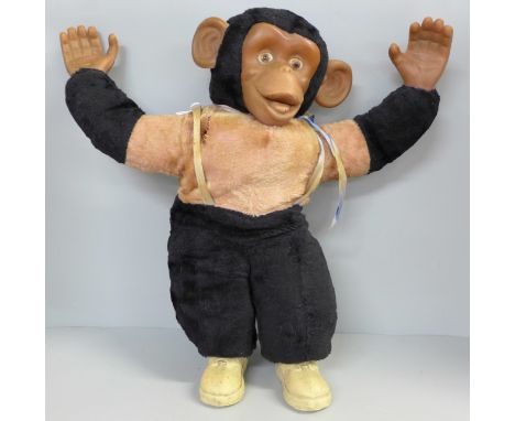 A vintage straw filled chimpanzee, 47cm, a/f 