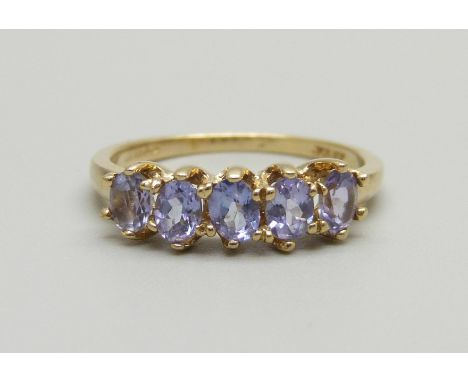 A 9ct gold and five stone tanzanite ring, 2.4g, O 