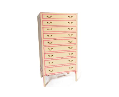 A retro vintage 20th century wooden painted tall chest of drawers. The tallboy having a series of nine narrow drawers with dr