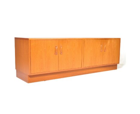 G-plan - Fresco Range - A retro vintage circa 1960s teak low sideboard credenza having lipped handles with double twin doors 