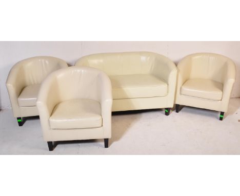 A retro vintage 20th Century white faux leather stitched club / fireside lounge suite comprising of a two seater sofa, togeth