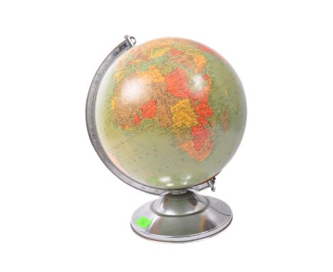 A vintage 20th Century replogle 12 inch library globe. Having a curved metal arm with a chrome circular base with illuminatin