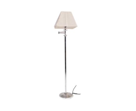 A contemporary floor standing standard lamp light. Having a white netted shade, with a chrome tubular frame with adjustable s