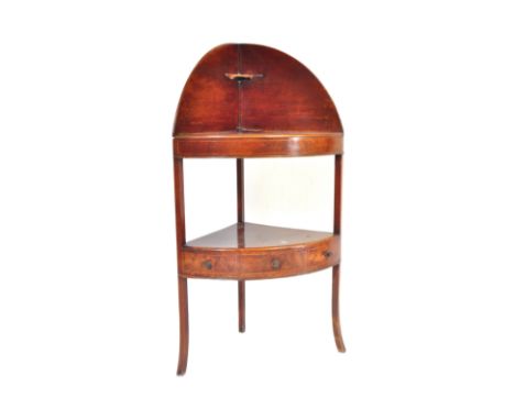 A 19th century George III mahogany washstand. Tapering legs with lower triangular frieze having drawers to the front. Above, 