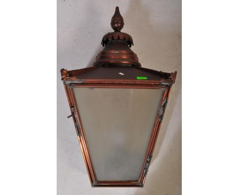 A 19th Century Victorian copper street lamp lantern light shade. Having a shaped finial on top with stepped circular column o