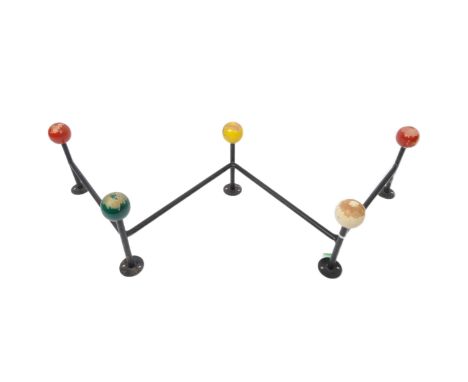A retro vintage mid 20th century circa. 1960s atomic style coat rack having ebonised wire metal frame with painted wooden bal