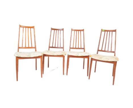 A set of four retro vintage mid 20th century teak high rail back dining chairs of Danish influence in the manner of K S Moble