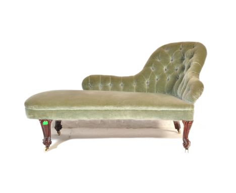 A 19th Century mahogany chaise longue day bed. Of small proportion with green upholstered button back fabric with arched curv