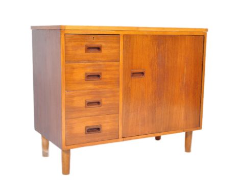 A retro vintage 20th century teak low sideboard having straight top over a bank of four drawers &amp; large single door cupbo