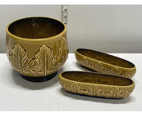 A vintage Sylvac planter and two smaller planters with leaf decoration, shipping unavailable