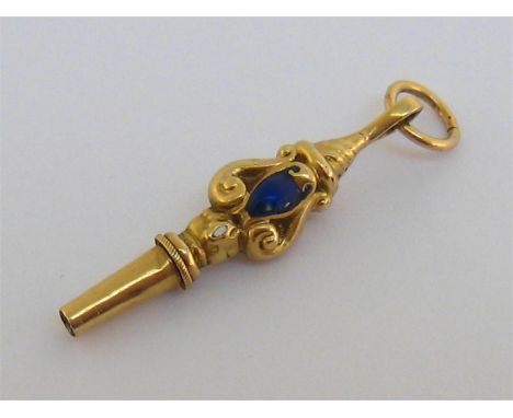 A mid 19th century yellow metal (tests 14 carat) and enamel watch key, 3.5cm long, 2gms
