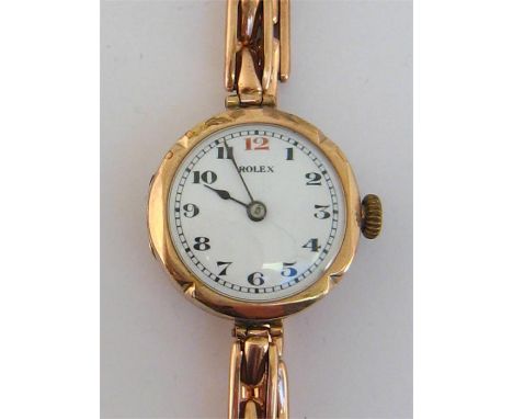 Rolex, a 1920s 9 carat gold manual wind wristwatch, the three piece case import marked Glasgow 1924 and signed ‘R.W.C Ltd’, n