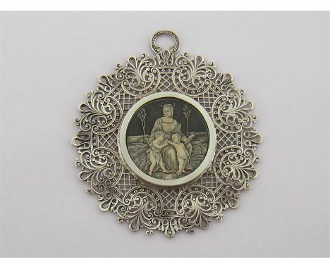 An Italian silver .800 standard pendant by Vittorio Barzaghi, Milan, circa 1952/68, pierced with anthemions, “C” scrolls and 