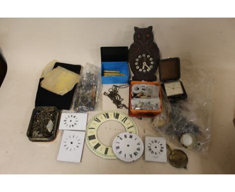 A BOX OF ASSORTED CLOCK PARTS 