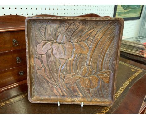 A JAPANESE RECTANGULAR CARVED SYCAMORE TRAY WITH IRISES - REPUTABLY RETAILED BY LIBERTY'S