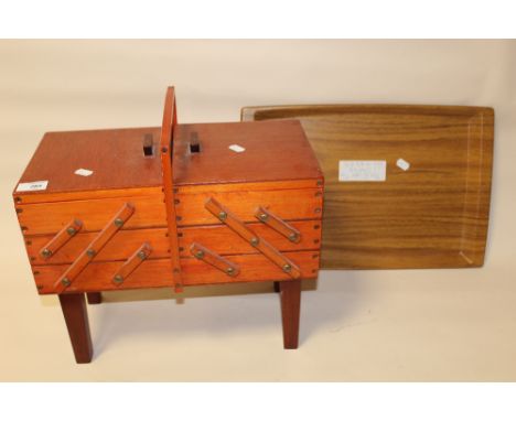 A WOODEN FOLD OUT SEWING BOX TOGETHER WITH A WOODEN SERVING TRAY