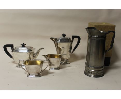 AN ART DECO STYLE SILVER PLATED FOUR PIECE TEA SERVICE TOGETHER WITH A BOXED CLAUDIO DESIGN METAL JUG
