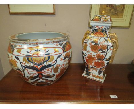 A LARGE MODERN EASTERN CERAMIC JARDINAIRE H-31 CM WITH A MATCHED TEMPLE JAR AND COVER H-47 CM (2)