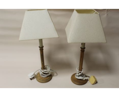 A PAIR OF LAURA ASHLEY LIGHT OAK TABLE LAMPS, OVERALL HEIGHT 54 CM