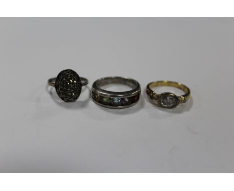 A MULTI GEM STONE SILVER DRESS RING, TOGETHER WITH A SILVER GILT EXAMPLE AND A SILVER AND MARCASITE RING (3) 